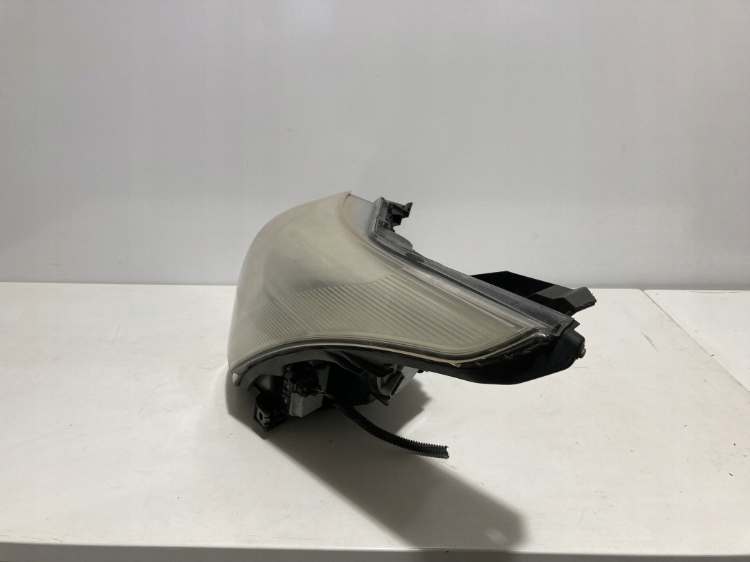 Toyota Avensis T25 lampa lewa przód RHD H279AL-DE HAL Koito używana - UK - zdjęcie 2