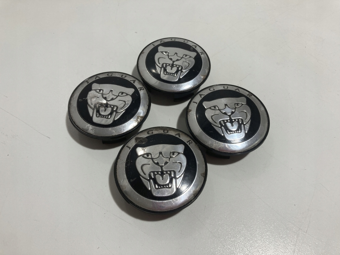 Dekielki kapsle na felgi Jaguar 9W9M-1A096-AC 59 mm 4 szt.